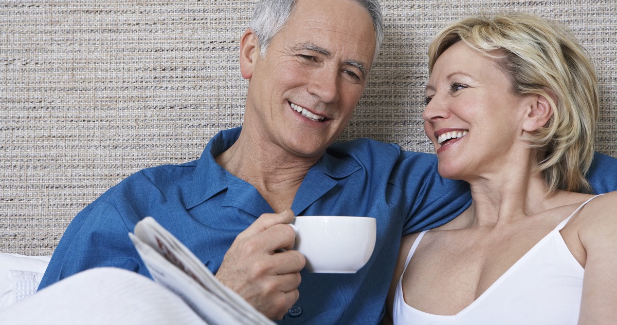 Couple reading newspaper - Baby Boomers Trust Print