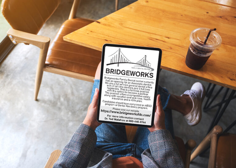 Man looking at a Display ad for recruitment advertising on a tablet. Display Advertising for health care industries in print or online