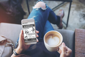 person looking at ads on their cell phone Place display advertising online
